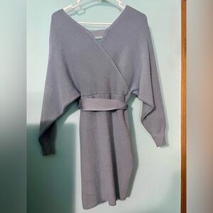 This is a VERY soft sweater dress. Worn once. Listed as a Large but is stretchy.